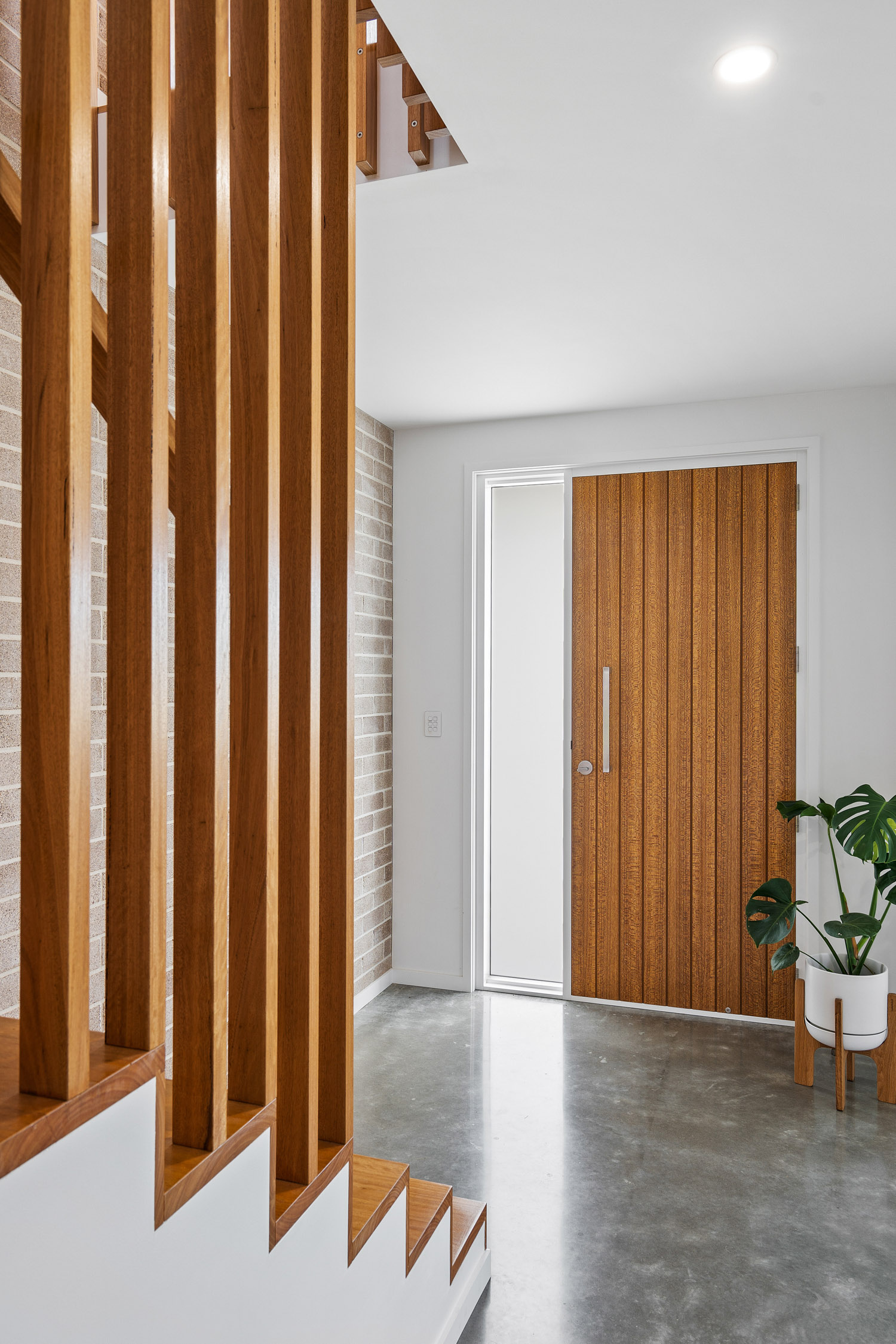 Portfolios 8 Entry way into stairway with wooden features